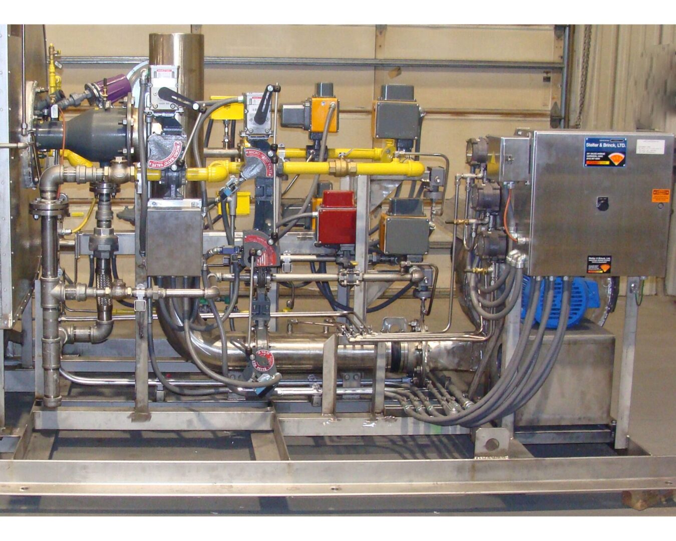 Our burner service techs travel with commonly used parts. A machine with many pipes and wires on it
