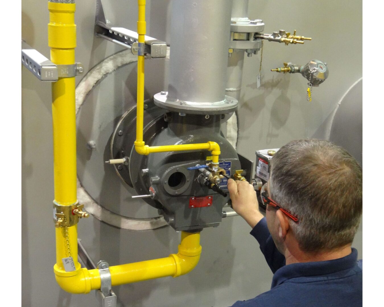 A man working on an industrial machine